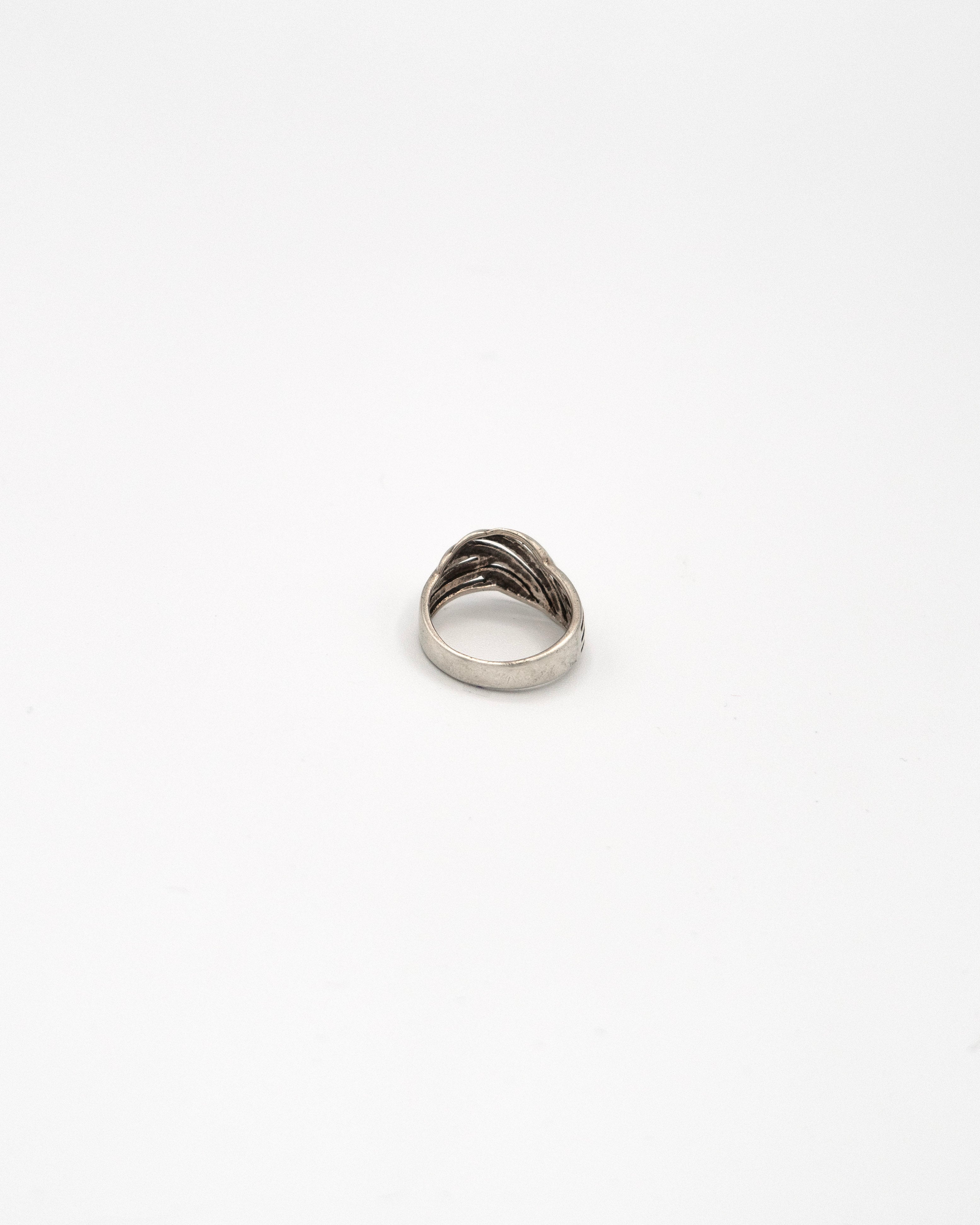 Ring with a multi-line design