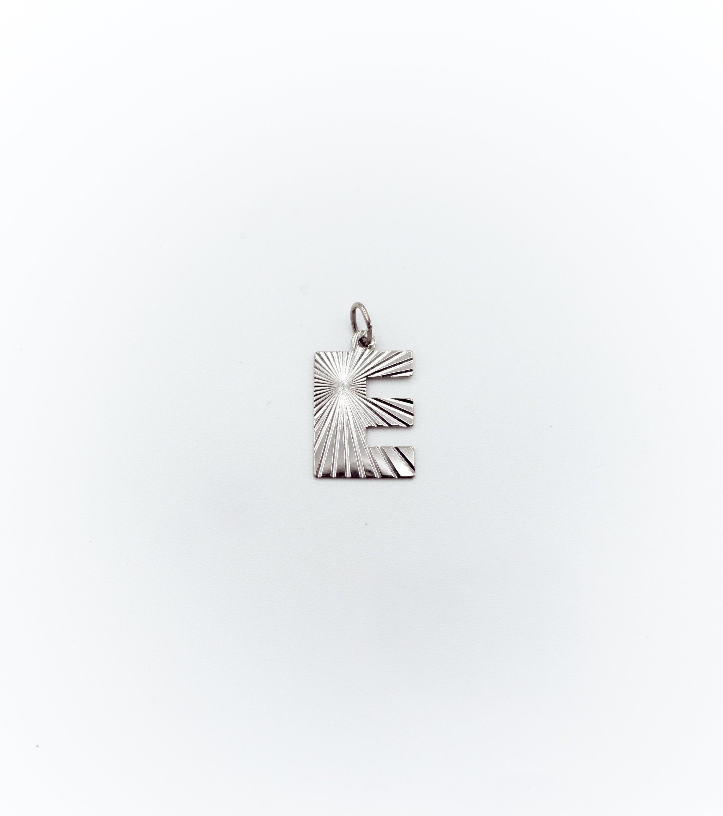 Textured letter ‘’E’’ pendant