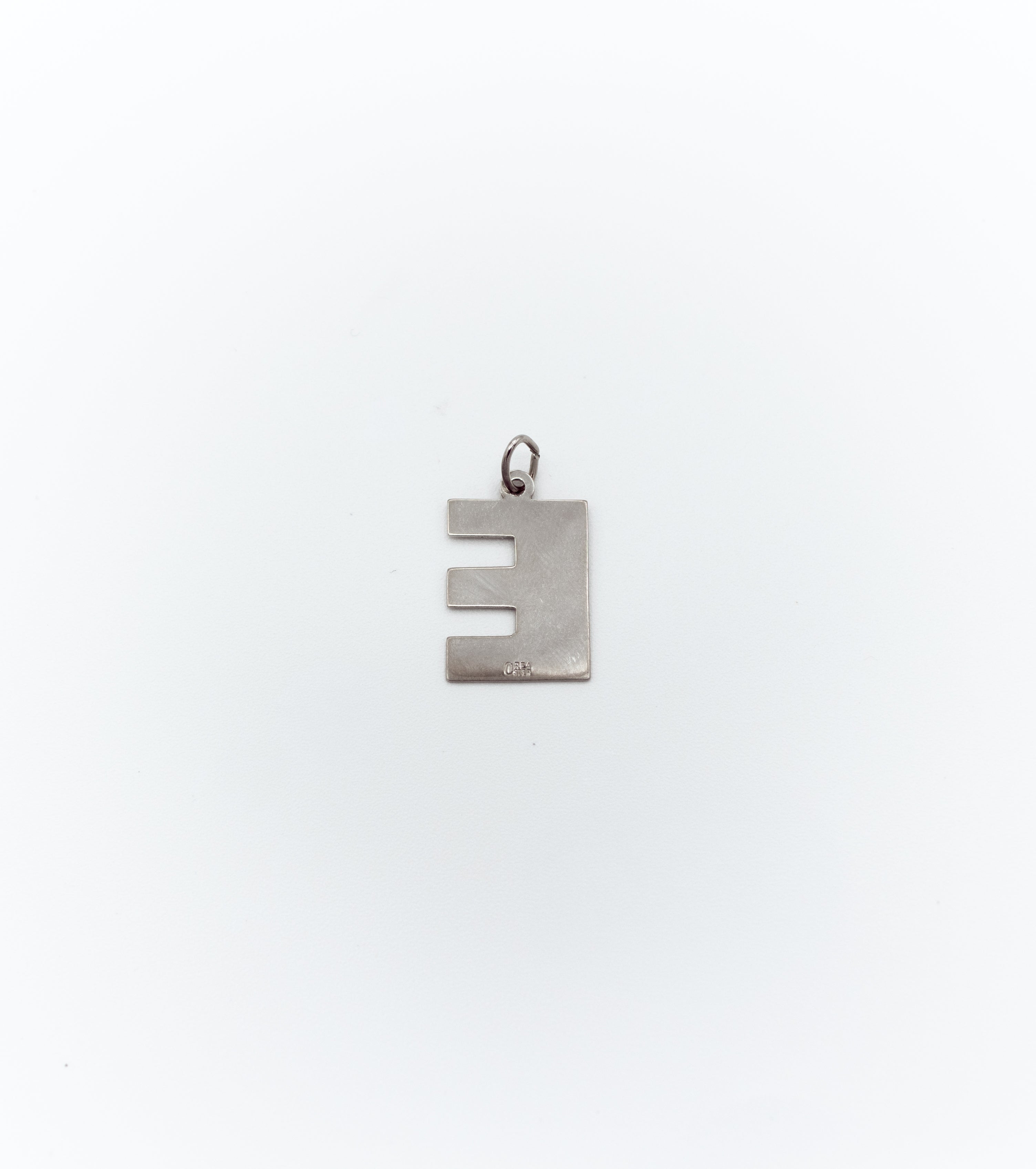 Textured letter ‘’E’’ pendant