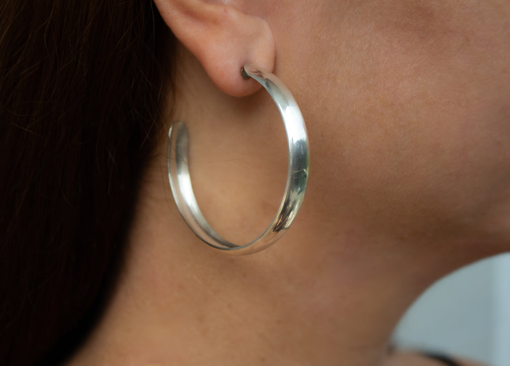 Wide flat open hoop earrings