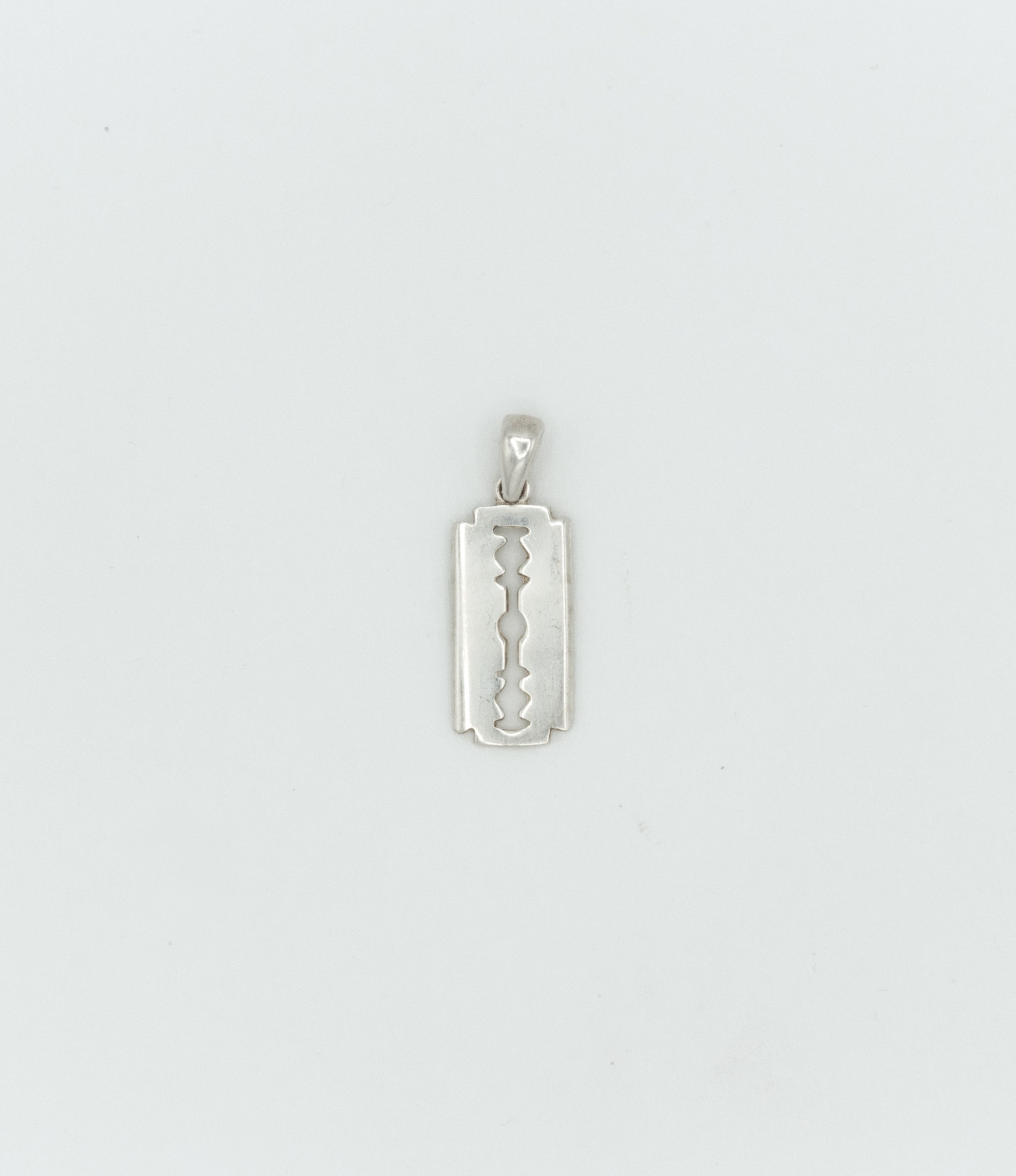 Small razor blade pendant