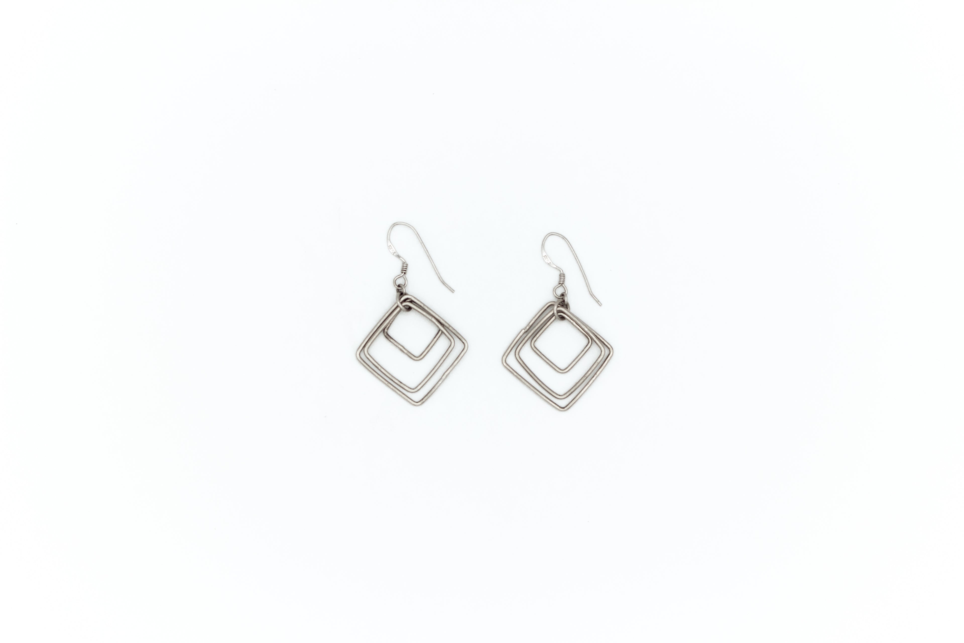 Triple square dangle
